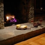 fireplace with cheese and wine