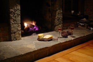 fireplace with cheese and wine